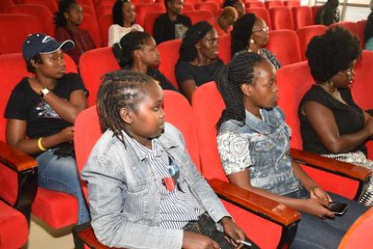 female students  engage senior women employees from EABL during talks at UoN