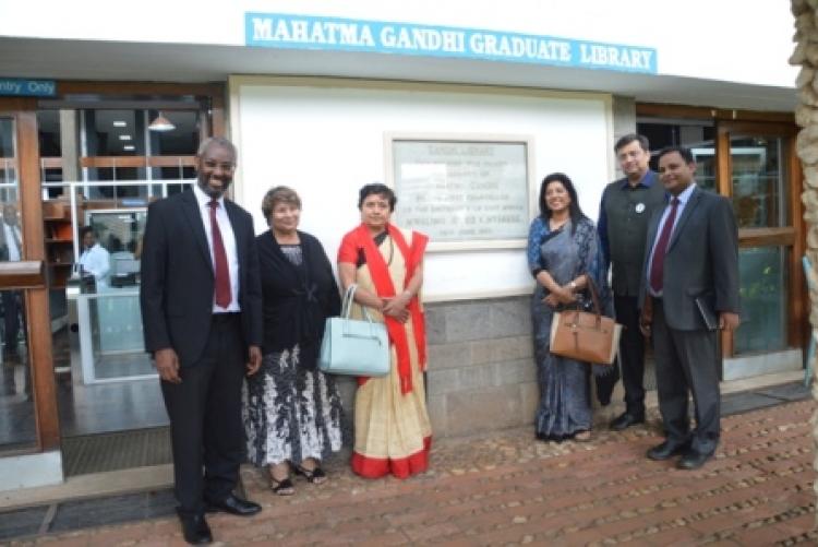 The team poses outside the Mahatma Gandhi llibrary for group photo