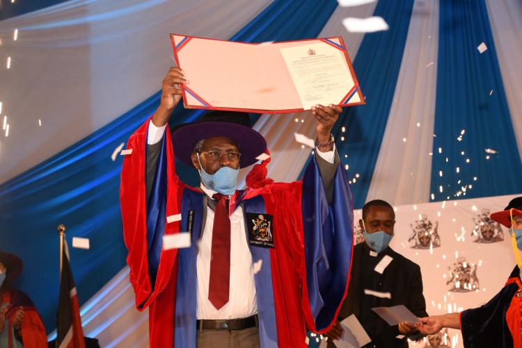 Prof. Kiama receives the Code of Conduct and ethics for Public Universities, 2009